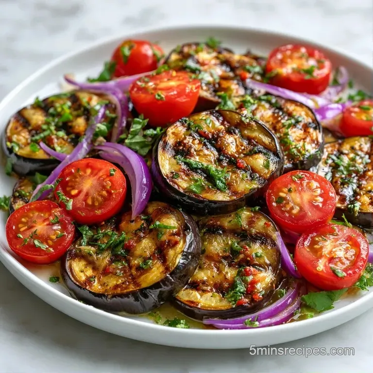Slices of charred purple eggplant arranged in a circle, garnished with feta crumbles and a vibrant lemon vinaigrette.